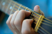 Позиции пальцев левой руки на грифе гитары